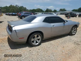 2016 Dodge Challenger SXT z VIN 2C3CDZAG8GH176838, wystawiony jako Copart lot #54515285 z przebiegiem 150 752 mil mil oraz Szkoda całkowita • Salvage title. Historia ofert i sprzedaży dostępna na DreamBid. Obrazek 3.