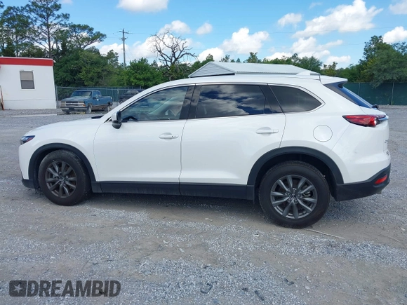 2022 Mazda CX-9 Touring z VIN JM3TCBCY7N0600787, wystawiony jako IAAI lot #42240512 z przebiegiem 27 927 mil mil oraz . Historia ofert i sprzedaży dostępna na DreamBid. Obrazek 14.