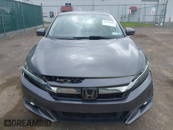 2018 Honda Clarity Touring z VIN JHMZC5F3XJC001054, wystawiony jako IAAI lot #42292688 z przebiegiem 60 780 mil mil oraz . Historia ofert i sprzedaży dostępna na DreamBid. Obrazek 12.