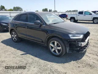2015 Audi Q3 Premium Plus with VIN WA1EFCFS3FR013984, listed as a Copart auction lot 58785965 with 172,930 mi miles and Salvage title. Bid and sale history available at DreamBid. Image 4.