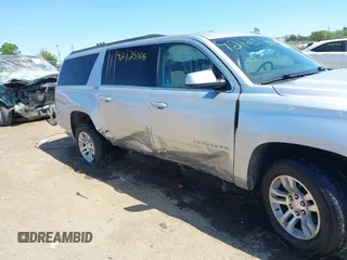 2017 Chevrolet Suburban LT z VIN 1GNSKHKC9HR268651, wystawiony jako IAAI lot #42125406 z przebiegiem 174 451 mil mil oraz . Historia ofert i sprzedaży dostępna na DreamBid. Obrazek 6.