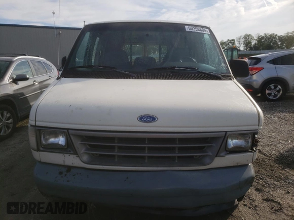 1992 Ford Econoline Cargo with VIN 1FTEE14Y2NHB57650, listed as a Copart auction lot 60258605 with 313,337 mi miles and Salvage title. Bid and sale history available at DreamBid. Image 5.