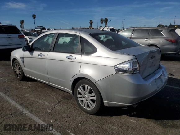 2009 Ford Focus SEL with VIN 1FAHP37N39W232674, listed as a Copart auction lot 42154695 with 127,764 mi miles and Salvage Title. Bid and sale history available at carsss.com. Image 2.