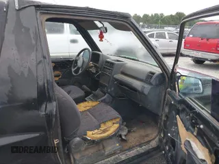 1995 Geo Tracker z VIN 2CNBE18U0S6943292, wystawiony jako IAAI lot #41274067 z przebiegiem Nie podano mil oraz . Historia ofert i sprzedaży dostępna na DreamBid. Obrazek 5.