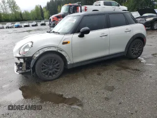 2016 MINI Hardtop 4 Door z VIN WMWXU1C51G2D12553, wystawiony jako Copart lot #52935265 z przebiegiem 57 593 mil mil oraz Szkoda całkowita • Salvage title. Historia ofert i sprzedaży dostępna na DreamBid. Obrazek 1.