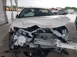 2025 Toyota Camry LE with VIN 4T1DAACK9SU112515, listed as a IAAI auction lot 41932562 with 587 mi miles and . Bid and sale history available at DreamBid. Image 6.