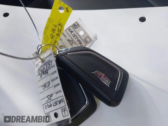 2025 Cadillac Escalade z VIN 1GYS8ERL0SR151490, wystawiony jako IAAI lot #41378504 z przebiegiem Nie podano mil oraz . Historia ofert i sprzedaży dostępna na DreamBid. Obrazek 11.