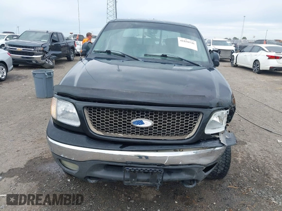2002 Ford F-150 XLT with VIN 1FTRW08L32KD90202, listed as a IAAI auction lot 41850546 with 256,807 mi miles. Bid and sale history available at carsss.com. Image 6.