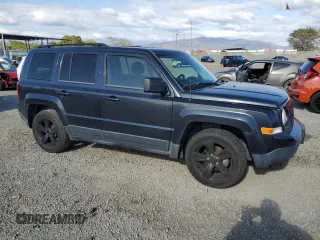 2014 Jeep Patriot Sport with VIN 1C4NJPBA1ED818984, listed as a Copart auction lot 54795865 with 123,786 mi miles and Clean title. Bid and sale history available at DreamBid. Image 4.