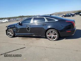 2015 Jaguar XJ with VIN SAJWA2GT2FMV84567, listed as a Copart auction lot 45231514 with 60,717 mi miles and . Bid and sale history available at DreamBid. Image 2.