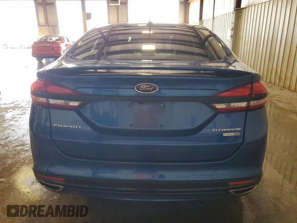 2017 Ford Fusion Titanium z VIN 3FA6P0D99HR162354, wystawiony jako Copart lot #61753395 z przebiegiem 100 678 mil mil oraz Szkoda całkowita • Salvage title. Historia ofert i sprzedaży dostępna na DreamBid. Obrazek 6.
