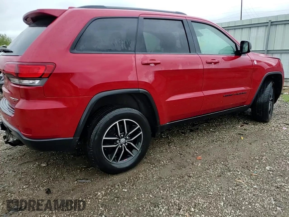 2017 Jeep Grand Cherokee Trailhawk with VIN 1C4RJFLG4HC932891, listed as a Copart auction lot 57217665 with 188,510 mi miles and Salvage title. Bid and sale history available at DreamBid. Image 14.