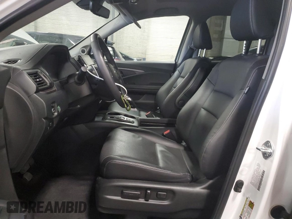 2023 Honda Ridgeline RTL with VIN 5FPYK3F56PB037672, listed as a Copart auction lot 56315435 with 26,550 mi miles and Salvage title. Bid and sale history available at DreamBid. Image 7.