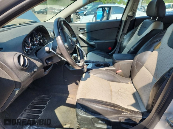 2009 Pontiac G6 with VIN 1G2ZL577894230250, listed as a Copart auction lot 63275235 with 166,792 mi miles and Clean title. Bid and sale history available at DreamBid. Image 7.