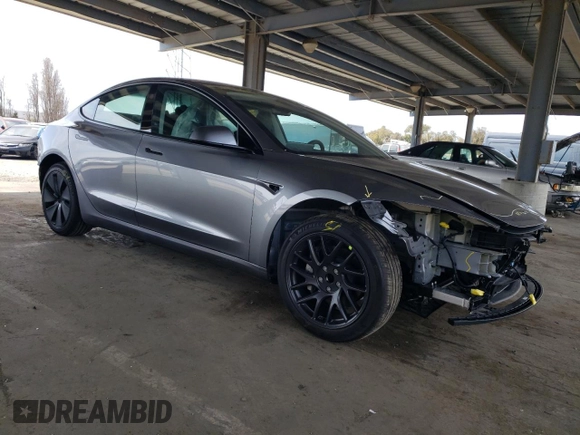 2025 Tesla Model 3 Long Range with VIN 5YJ3E1EA8SF880617, listed as a Copart auction lot 49484815 with 2,625 mi miles and Salvage Title. Bid and sale history available at DreamBid. Image 4.