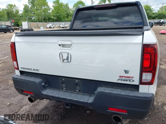 2021 Honda Ridgeline Sport with VIN 5FPYK3F14MB005117, listed as a IAAI auction lot 42343059 with 58,862 mi miles and . Bid and sale history available at DreamBid. Image 16.
