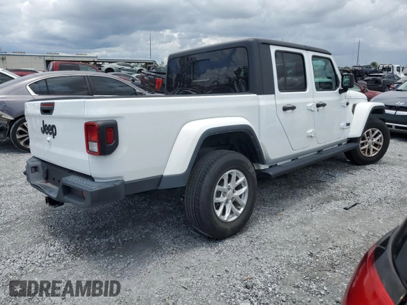 2023 Jeep Gladiator Freedom z VIN 1C6HJTAG6PL535119, wystawiony jako Copart lot #56870905 z przebiegiem 23 707 mil mil oraz Szkoda całkowita • Salvage title. Historia ofert i sprzedaży dostępna na DreamBid. Obrazek 3.
