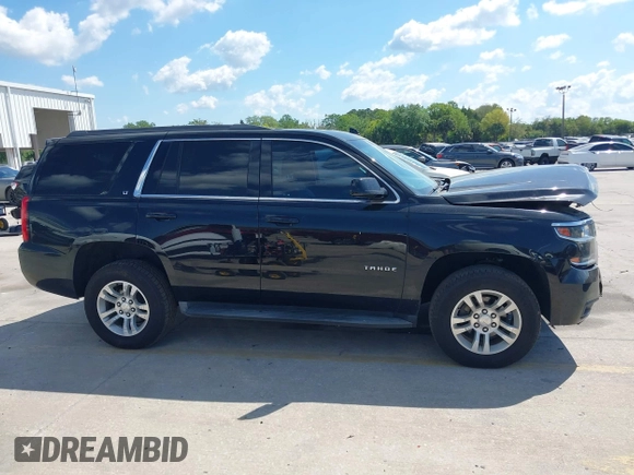 2019 Chevrolet Tahoe LT z VIN 1GNSKBKC1KR200476, wystawiony jako IAAI lot #41897702 z przebiegiem 136 432 mil mil oraz . Historia ofert i sprzedaży dostępna na DreamBid. Obrazek 13.
