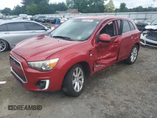 2015 Mitsubishi Outlander SE z VIN 4A4AR4AU8FE026756, wystawiony jako Copart lot #63990145 z przebiegiem 134 060 mil mil oraz Szkoda całkowita • Salvage title. Historia ofert i sprzedaży dostępna na DreamBid. Obrazek 1.