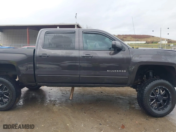 2015 Chevrolet Silverado 1500 LT with VIN 3GCUKRECXFG104194, listed as a IAAI auction lot 41029090 with 149,530 mi miles. Bid and sale history available at carsss.com. Image 14.