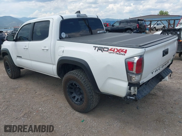 2022 Toyota Tacoma SR with VIN 3TMCZ5AN1NM478457, listed as a IAAI auction lot 42479107 with 59,547 mi miles and . Bid and sale history available at DreamBid. Image 3.