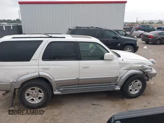 1999 Toyota 4Runner Limited z VIN JT3GN87R5X0118188, wystawiony jako IAAI lot #42278491 z przebiegiem 110 273 mil mil oraz . Historia ofert i sprzedaży dostępna na DreamBid. Obrazek 13.