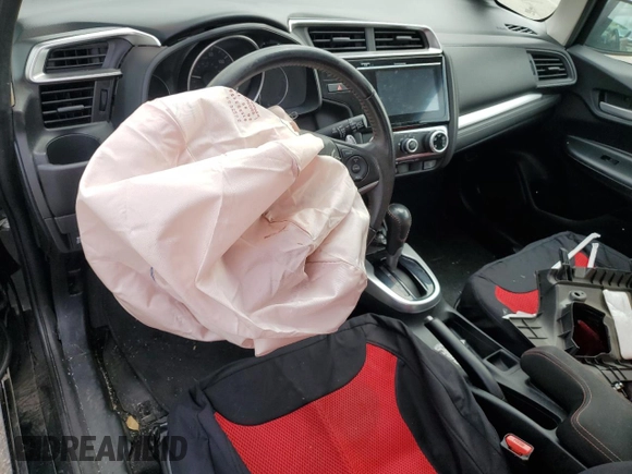 2018 Honda Fit Sport z VIN 3HGGK5H65JM702183, wystawiony jako Copart lot #55439775 z przebiegiem Nie podano mil oraz Szkoda całkowita • Salvage title. Historia ofert i sprzedaży dostępna na DreamBid. Obrazek 8.