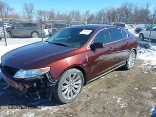 2012 Lincoln MKS with VIN 1LNHL9ER7CG803675, listed as a IAAI auction lot 41622367 with 128,157 mi miles. Bid and sale history available at carsss.com. Image 2.