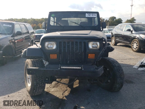 1995 Jeep Wrangler S with VIN 1J4FY19P0SP266468, listed as a Copart auction lot 74011814 with 269,912 mi miles and Salvage Title. Bid and sale history available at carsss.com. Image 5.