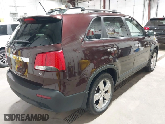 2012 Kia Sorento EX with VIN 5XYKU3A60CG254775, listed as a IAAI auction lot 42638220 with 49,000 mi miles and . Bid and sale history available at DreamBid. Image 4.