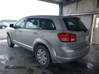 2014 Dodge Journey SE with VIN 3C4PDCAB1ET194066, listed as a IAAI auction lot 42117527 with 184,490 mi miles and . Bid and sale history available at carsss.com. Image 3.