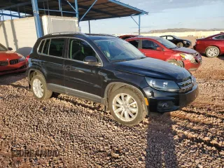 2015 Volkswagen Tiguan SEL with VIN WVGAV7AX2FW524276, listed as a Copart auction lot 63631995 with 87,284 mi miles and Salvage title. Bid and sale history available at DreamBid. Image 4.