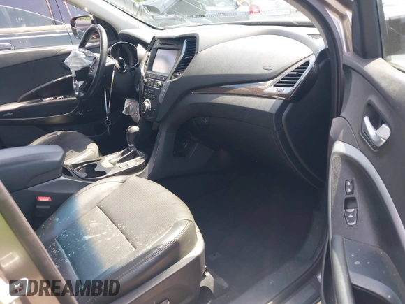 2017 Hyundai Santa Fe Ultimate z VIN 5NMZW4LA7HH047989, wystawiony jako IAAI lot #42051500 z przebiegiem 75 747 mil mil oraz . Historia ofert i sprzedaży dostępna na DreamBid. Obrazek 5.