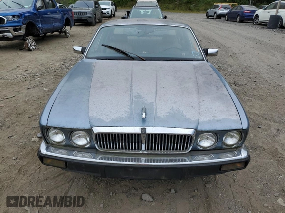 1989 Jaguar XJ with VIN SAJHY1540KC578115, listed as a Copart auction lot 69142274 with Not Provided miles and Clean Title. Bid and sale history available at DreamBid. Image 5.