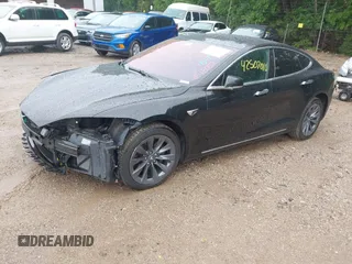 2018 Tesla Model S 75D with VIN 5YJSA1E21JF283971, listed as a IAAI auction lot 42507010 with 117,934 mi miles and . Bid and sale history available at DreamBid. Image 2.