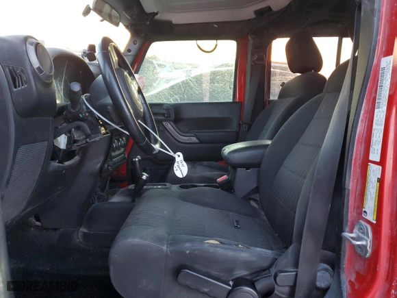 2012 Jeep Wrangler Unlimited Sport with VIN 1C4HJWDG7CL114297, listed as a Copart auction lot 42144525 with 165,482 mi miles and Salvage Title. Bid and sale history available at carsss.com. Image 7.