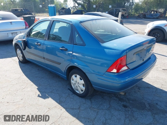 2000 Ford Focus LX with VIN 1FAFP33P8YW330922, listed as a IAAI auction lot 41643279 with 153,400 mi miles and . Bid and sale history available at carsss.com. Image 3.