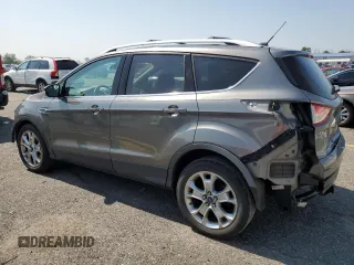 2014 Ford Escape Titanium с VIN 1FMCU0J96EUD41199, выставлен на аукционе Copart как лот 59380245 с пробегом 100 319 миль миль и Списание • Salvage title. История ставок и продаж доступна на DreamBid. Изображение 2.