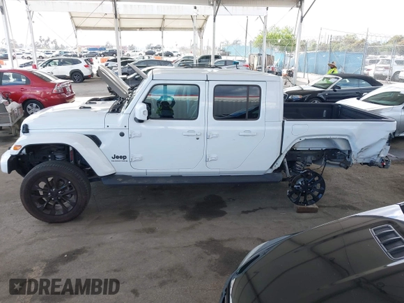 2023 Jeep Gladiator Overland with VIN 1C6HJTFG7PL543870, listed as a IAAI auction lot 42056969 with 28,655 mi miles and . Bid and sale history available at DreamBid. Image 15.