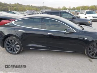 2017 Tesla Model S 100D with VIN 5YJSA1E28HF188981, listed as a IAAI auction lot 42010115 with 76,327 mi miles and . Bid and sale history available at DreamBid. Image 13.