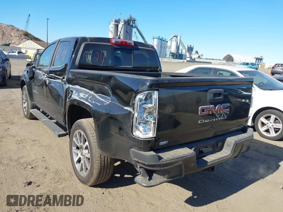 2021 GMC Canyon 4WD Denali z VIN 1GTG6EEN9M1240596, wystawiony jako IAAI lot #40760124 z przebiegiem 52 985 mil mil oraz . Historia ofert i sprzedaży dostępna na DreamBid. Obrazek 19.