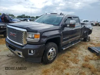 2015 GMC Sierra 3500HD Denali z VIN 1GT424E87FF588292, wystawiony jako Copart lot #65950764 z przebiegiem 128 416 mil mil oraz Szkoda całkowita • Salvage title. Historia ofert i sprzedaży dostępna na DreamBid. Obrazek 2.