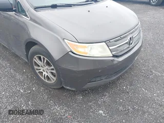 2012 Honda Odyssey EX-L with VIN 5FNRL5H64CB060468, listed as a IAAI auction lot 42182501 with 236,399 mi miles and . Bid and sale history available at carsss.com. Image 6.