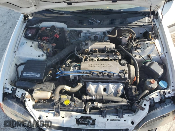 1995 Honda Civic LX z VIN JHMEG8658SS004550, wystawiony jako Copart lot #58214995 z przebiegiem 96 633 mil mil oraz Szkoda całkowita • Salvage title. Historia ofert i sprzedaży dostępna na DreamBid. Obrazek 11.