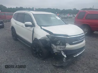 2018 Honda Pilot Touring с VIN 5FNYF6H99JB012111, выставлен на аукционе IAAI как лот 42459694 с пробегом 82 700 миль миль и . История ставок и продаж доступна на DreamBid. Изображение 1.