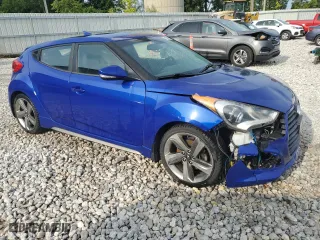 2014 Hyundai Veloster Turbo with VIN KMHTC6AE8EU183497, listed as a Copart auction lot 62950724 with 123,751 mi miles and Clean Title. Bid and sale history available at carsss.com. Image 4.