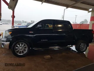 2012 Toyota Tundra 4WD Truck with VIN 5TFDW5F1XCX253223, listed as a IAAI auction lot 41453842 with 163,730 mi miles. Bid and sale history available at carsss.com. Image 15.