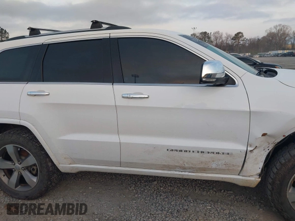 2015 Jeep Grand Cherokee High Altitude with VIN 1C4RJECG8FC175565, listed as a IAAI auction lot 41733248 with 107,947 mi miles. Bid and sale history available at carsss.com. Image 14.