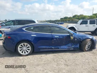 2017 Tesla Model S 100D with VIN 5YJSA1E28HF217489, listed as a IAAI auction lot 42128388 with Not provided miles and . Bid and sale history available at DreamBid. Image 14.