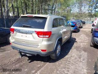 2011 Jeep Grand Cherokee Laredo with VIN 1J4RR4GG8BC590094, listed as a IAAI auction lot 41990149 with 178,510 mi miles. Bid and sale history available at carsss.com. Image 4.
